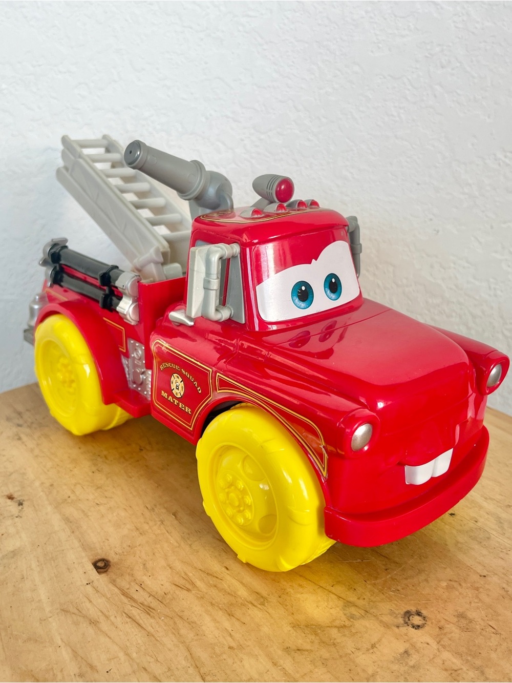 Disney Pixar Cars Rescue Squad Mater Fire Truck Toy Red 9.5 Inch Water Shooter